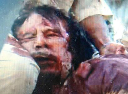 Vandasovi extremisté: Smrt Kaddáfího je barbarský čin
