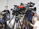 Kamery na tiskové konferenci