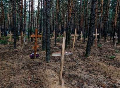 Ukrajina: Někteří sbírají dřevo, jiní mrtvoly